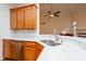Open kitchen with stainless steel appliances, countertops, and eat-in breakfast bar at 403 Hidden Hills Ct, Canton, GA 30115
