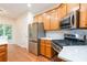 Well-equipped kitchen with stainless appliances, and ample storage, ready for culinary adventures at 403 Hidden Hills Ct, Canton, GA 30115