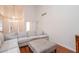 Spacious living room with hardwood floors, a comfortable sectional sofa, and ample natural light at 403 Hidden Hills Ct, Canton, GA 30115