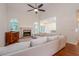 Bright and airy living room with a fireplace, hardwood floors, and a comfortable sectional sofa at 403 Hidden Hills Ct, Canton, GA 30115