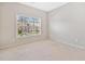 Comfortable bedroom with carpet and a bright window at 100 Trailside Way, Hiram, GA 30141