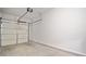 Spacious two-car garage provides ample parking and storage at 100 Trailside Way, Hiram, GA 30141