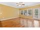 Open-concept space with hardwood flooring and lots of natural light at 100 Trailside Way, Hiram, GA 30141