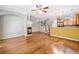 Spacious living area with hardwood floors, fireplace, and staircase at 100 Trailside Way, Hiram, GA 30141