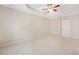 Spacious main bedroom features tray ceiling and neutral carpet at 100 Trailside Way, Hiram, GA 30141