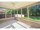 Covered porch with wooded backyard view at 100 Trailside Way, Hiram, GA 30141