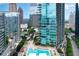 Condominium featuring rooftop pool, lounge area, and city views from a high-rise building at 1080 Peachtree Ne St # 1402, Atlanta, GA 30309