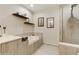 Spa-like bathroom with a soaking tub, a glass-enclosed shower, and contemporary fixtures at 1080 Peachtree Ne St # 1402, Atlanta, GA 30309