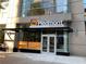 Exterior view of a Piedmont Physicians office, featuring modern architecture and clear signage for medical services at 1080 Peachtree Ne St # 1402, Atlanta, GA 30309