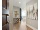 Hallway boasts modern decor, light hardwood floors, and a glimpse of the open kitchen at 1080 Peachtree Ne St # 1402, Atlanta, GA 30309