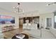 Open floor plan showcasing the living area and kitchen with city skyline views at 1080 Peachtree Ne St # 1402, Atlanta, GA 30309