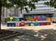 A large, colorful 'MIDTOWN' sign adding vibrancy and character to the urban landscape with buildings behind at 1080 Peachtree Ne St # 1402, Atlanta, GA 30309