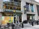 Exterior of a Panera Bread storefront featuring outdoor seating and visible signage, inviting for a quick meal at 1080 Peachtree Ne St # 1402, Atlanta, GA 30309