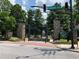 Entrance to Piedmont Park featuring stone pillars, wrought iron gates, and manicured landscaping, welcoming visitors at 1080 Peachtree Ne St # 1402, Atlanta, GA 30309