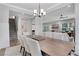 Stylish dining area next to the living room and staircase, offering an open-concept layout perfect for entertaining at 16 Dovecrest Way, Acworth, GA 30101