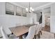 Elegant dining area featuring modern chandelier, neutral decor and furniture, and an open layout concept at 16 Dovecrest Way, Acworth, GA 30101