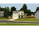 Charming two-story home with a well-manicured lawn and a two car garage at 16 Dovecrest Way, Acworth, GA 30101