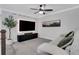 Cozy media room features a large entertainment center, comfortable seating, and a relaxing atmosphere at 16 Dovecrest Way, Acworth, GA 30101
