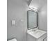 Bathroom with modern vanity, clean mirror and neutral wall color at 2201 Colonial Oak Way, Stone Mountain, GA 30087