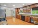 Traditional kitchen with wood cabinets, granite countertops, and stainless steel appliances at 2201 Colonial Oak Way, Stone Mountain, GA 30087