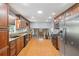 Open-concept kitchen featuring stainless steel appliances, granite countertops, and ample cabinet space at 2201 Colonial Oak Way, Stone Mountain, GA 30087