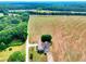 Aerial view of lovely home and surrounding acreage; a tranquil retreat at 259 Hwy 11, Social Circle, GA 30025