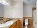 Bathroom with wood vanity, granite counters, and tile at 259 Hwy 11, Social Circle, GA 30025