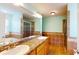Bathroom features tile countertops, soaking tub, and shower at 259 Hwy 11, Social Circle, GA 30025