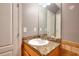 Bathroom featuring vanity with granite countertop and a large mirror at 259 Hwy 11, Social Circle, GA 30025