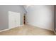 Bright bedroom featuring carpet flooring, neutral paint, and ample closet space at 259 Hwy 11, Social Circle, GA 30025