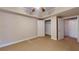 Bright carpeted bedroom featuring ample closet space at 259 Hwy 11, Social Circle, GA 30025
