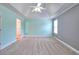 Bedroom featuring carpet and a ceiling fan with one window at 259 Hwy 11, Social Circle, GA 30025