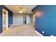 Large bedroom with carpeted floors and access to bathroom at 259 Hwy 11, Social Circle, GA 30025