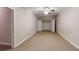 Bedroom featuring neutral carpet with a closet and adjacent doorway at 259 Hwy 11, Social Circle, GA 30025
