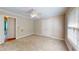 Clean bedroom with neutral walls, carpet flooring, a ceiling fan, and a closet with double doors at 259 Hwy 11, Social Circle, GA 30025