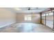 Spacious two-car garage with a concrete floor and natural light at 259 Hwy 11, Social Circle, GA 30025