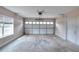 Bright two-car garage with concrete floors and an automatic overhead door at 259 Hwy 11, Social Circle, GA 30025