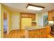 Functional kitchen boasting a center island, oak cabinetry, and an open design for easy access at 259 Hwy 11, Social Circle, GA 30025