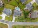 Overhead view of residences showcasing verdant lawns, landscaping and an in-ground pool at 4721 W Lakeshore Dr, Acworth, GA 30101