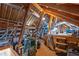 View of the unfinished attic space showing ductwork and stored items at 4721 W Lakeshore Dr, Acworth, GA 30101