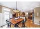 Charming breakfast nook with hardwood floors and an open view of the kitchen at 4721 W Lakeshore Dr, Acworth, GA 30101