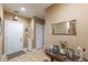 A tiled entryway featuring neutral walls, white doors, a table, decorative items, and a mirror at 4721 W Lakeshore Dr, Acworth, GA 30101