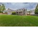 Inviting curb appeal of this home showcases an expansive lawn, and welcoming front porch at 4721 W Lakeshore Dr, Acworth, GA 30101