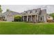 Beautiful home with front porch, brick accents and a lush green lawn at 4721 W Lakeshore Dr, Acworth, GA 30101