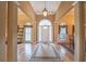 Open foyer with gleaming hardwood floors, soaring ceilings, elegant lighting and lots of natural light at 4721 W Lakeshore Dr, Acworth, GA 30101