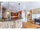 Eat-in kitchen features a breakfast bar, stainless steel appliances, and granite countertops at 4721 W Lakeshore Dr, Acworth, GA 30101