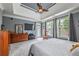 Bright and airy main bedroom with ceiling fan, trey ceiling, and access to the porch at 4721 W Lakeshore Dr, Acworth, GA 30101