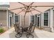 Rear covered patio with outdoor seating area at 4721 W Lakeshore Dr, Acworth, GA 30101