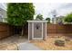 Backyard with a shed along the fence at 4721 W Lakeshore Dr, Acworth, GA 30101