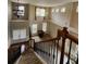 Living room view from 2nd floor, showcasing tall ceilings, lots of natural light, carpet floors, and dual entry at 5580 Jamerson Dr, Atlanta, GA 30349